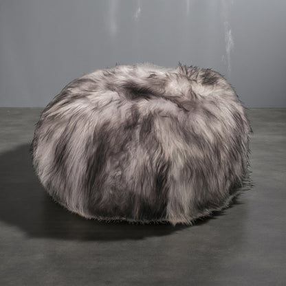 Norré – Ronde poef van IJslandse schapenvacht